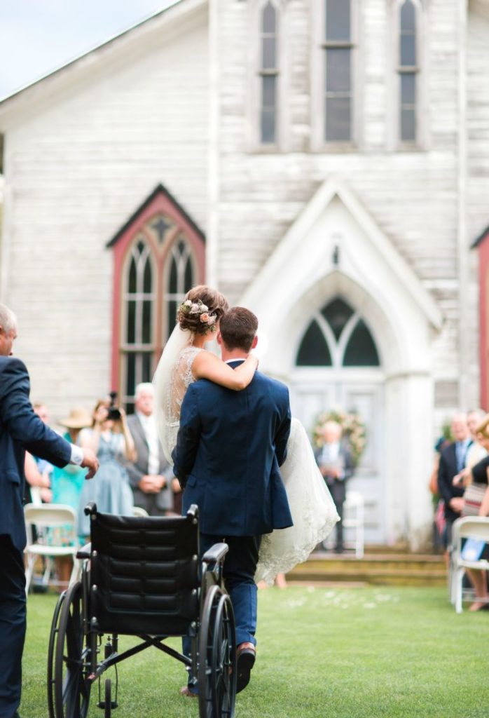 groom-carries-bride-altar-hands-story-love-knows-no-barriers-3